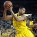 Michigan sophomore Trey Burke grabs a rebound during the game against Michigan State on Sunday, Mar. 3. Daniel Brenner I AnnArbor.com